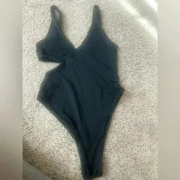 Black one piece bathing suit. - Picture 2 of 6
